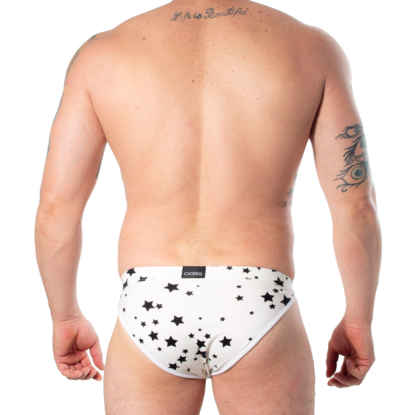 SB0054 Brief Bikini color hueso con estrellas negras skinit